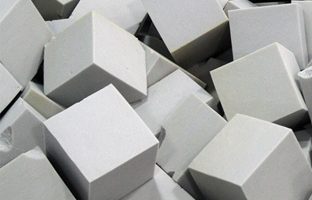 Grey foam blocks showing the material used in foam products