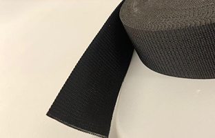 Close-up of a black nylon mat handle and its lining